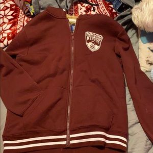 Fuzzy lined maroon zip up jacket